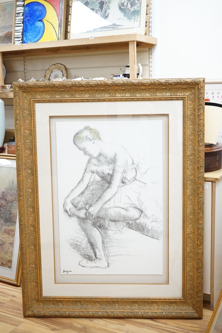 After Edgar Degas (1834-1917), colour lithograph, ’Danseuse assise ajustant son chausson’, 86 x 56cm, ornate gilt frame. Condition - good
